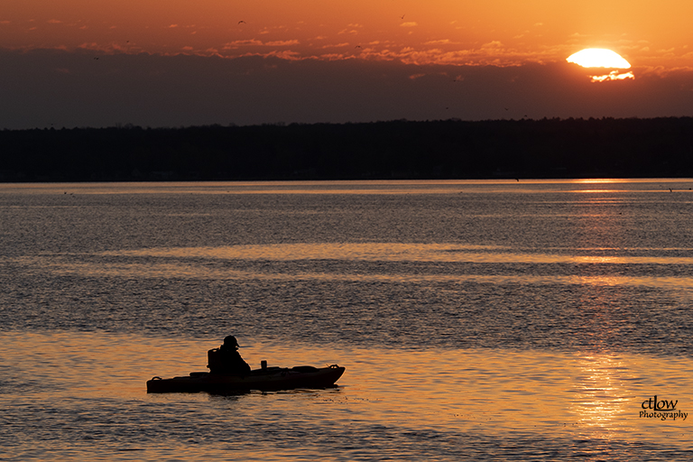 kayaker silhouette sunrise St. Lawrence River